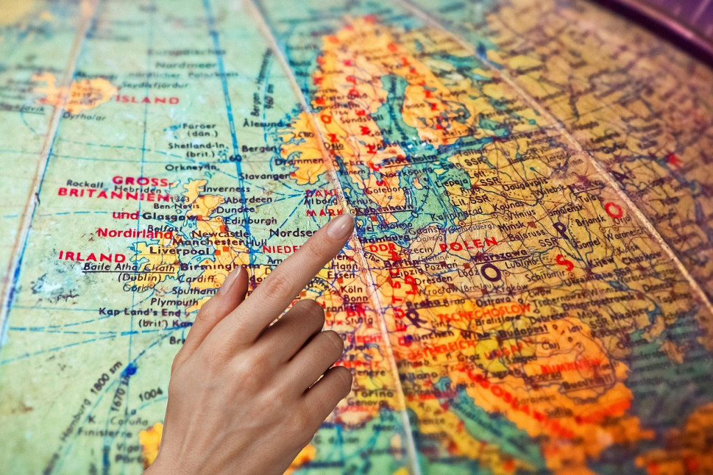 map, globe, world, earth, plan, show, finger, hand, world map, vacations, to travel, goal, trip, round, continent, countries, open, explore, new, multicultural, discover, people, evening expensive, abroad