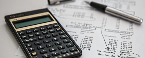 calculator-calculation-insurance-finance-53621-53621 Close-up of financial documents with calculator and pen, ideal for business management themes.